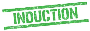 Yeşil grungy dikdörtgen damga işareti üzerinde INDUCTION metin.