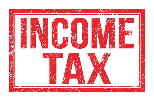 Income Tax 赤い四角形の切手に書かれた言葉 — ストック写真