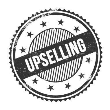 Siyah grungy zig zag kenarlarında yazılmış UPSELING metni yuvarlak pul.