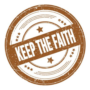 İnanç metnini kahverengi yuvarlak dokuma damgası üzerinde tut.