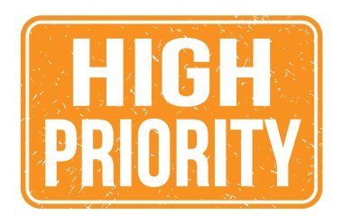 YÜKSEK ÖZEL, turuncu dikdörtgen damga işareti üzerine yazılmış kelimeler