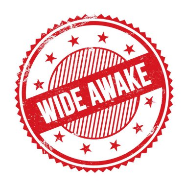 Kırmızı grungy zig zag kenarlarında yazılmış WIDE AWAKE metni yuvarlak pul.