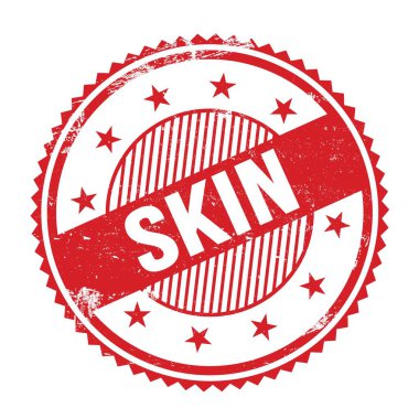 Kırmızı grungy zig zag kenarları yuvarlak damgalı SKIN metin.