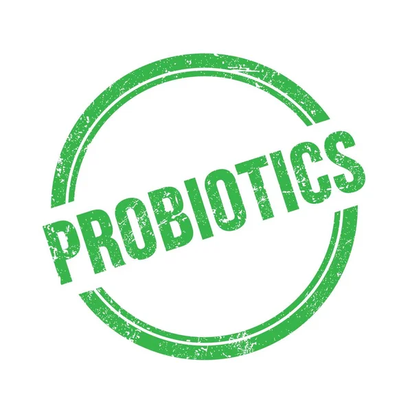 Yeşil grungy vintage yuvarlak pulu üzerine yazılmış PROBIOTICS metni.