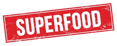 Kırmızı grungy dikdörtgen işareti üzerinde SUPERFOOD metni.