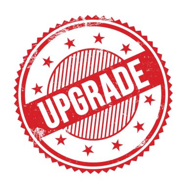 Kırmızı grungy zig zag kenarlarında yazılmış UPGRAD metni yuvarlak pul.