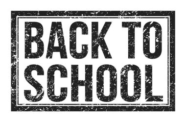 Okula Dönüş, siyah dikdörtgen mühür işareti üzerine yazılmış kelimeler