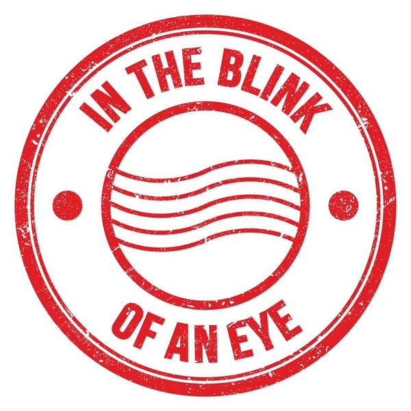 Kırmızı yuvarlak posta pulu işareti üzerine yazılmış bir göz kırpma metninde