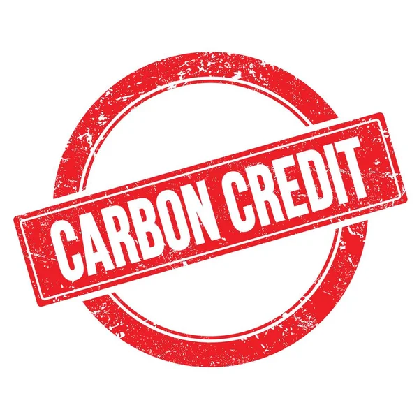 Kırmızı grungy yuvarlak vintage pul üzerinde CARBON CREDIT metin.