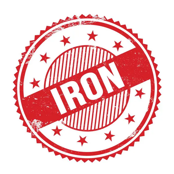 Kırmızı grungy zig zag kenarlarında yazılmış IRON metni yuvarlak pul.