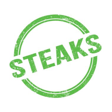 Yeşil grungy vintage yuvarlak pulu üzerine yazılmış STEAKS metni.