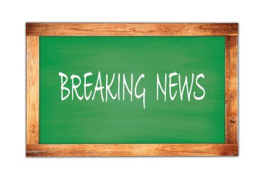 Yeşil ahşap çerçeve okul tahtasına yazılmış Kırıcı Haberler.