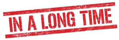 Kırmızı grungy dikdörtgen damga işareti üzerinde uzun bir Time metni.