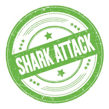 Shark Saldırısı yeşil yuvarlak dokuma damgası üzerine metin.