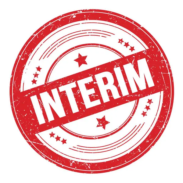 Kırmızı yuvarlak grungy doku damgası üzerine INTERIM metni.