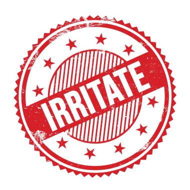 Kırmızı grungy zig zag kenarlarında yazılmış IRRITATE metin yuvarlak pul.