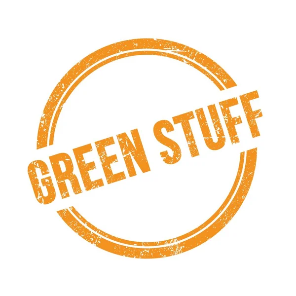 绿色的Stuff文字写在橙色的陈腐的圆形邮票上 — 图库照片