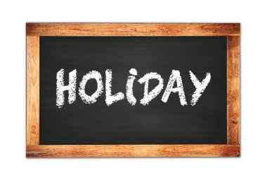 Siyah ahşap çerçeve okul tahtasına yazılmış tatil metni.