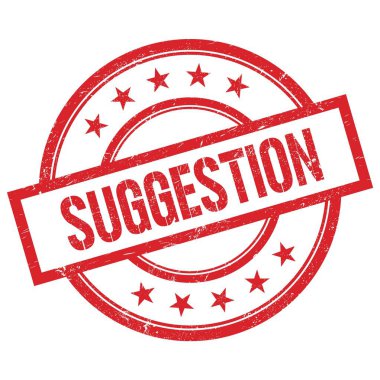 Kırmızı yuvarlak plastik damga üzerine yazılmış SUGGESTION metin.