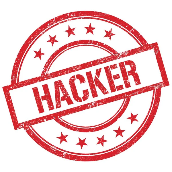 Kırmızı yuvarlak vintage kauçuk damgalı HACKER metni.