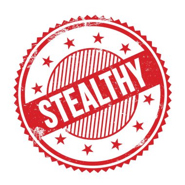 Kırmızı grungy zig zag kenarlarında yazılmış STEALTHY metin yuvarlak pul.
