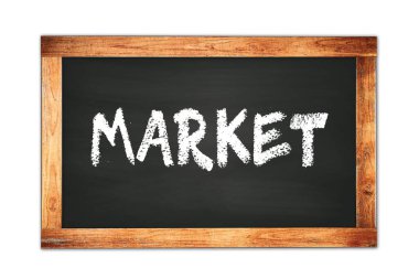 Siyah ahşap çerçeve okul tahtasına yazılmış MARKET metni.