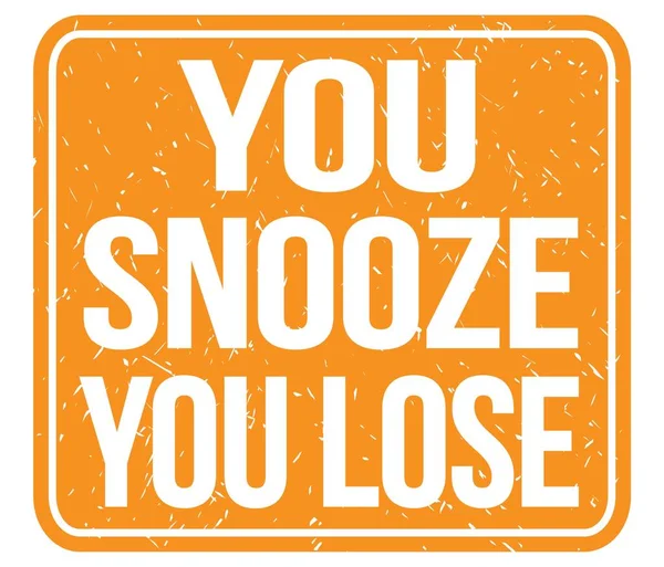 YOU SNOOZE YOU LOSE, text written on orange vintage stamp sign