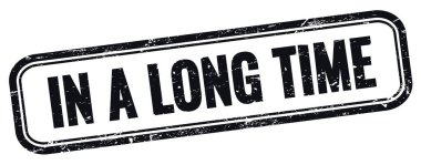 In a long time text on black grungy vintage dikdörtgen stamp.