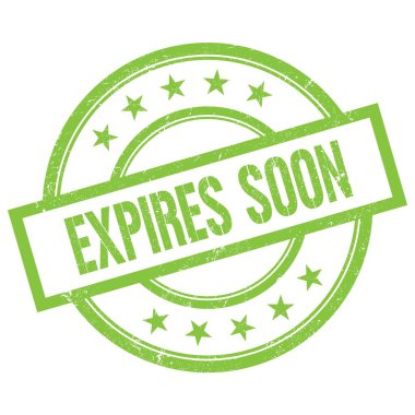 EXPIRES SOON text written on green round vintage rubber stamp.