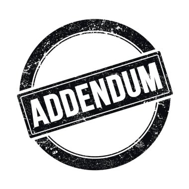 ADDENDUM text on black grungy round vintage stamp.