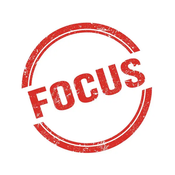 Kırmızı grungy vintage yuvarlak damga üzerine yazılmış FOCUS metni.