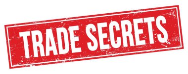 TRAD, kırmızı grungy dikdörtgen mühür işareti üzerindeki metni gizler.