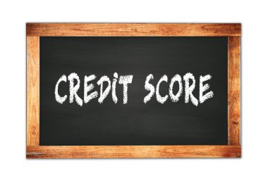 CREDIT  SCORE text written on black wooden frame school blackboard.