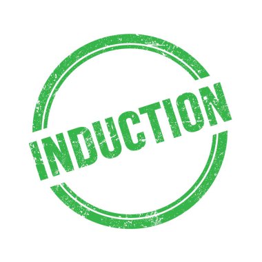 Yeşil grungy vintage yuvarlak pulu üzerine yazılmış INDUCTION metni.