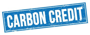 Mavi grungy dikdörtgen damga işareti üzerinde CARBON CREDIT metni.