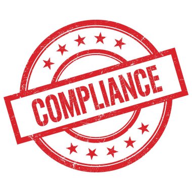 Kırmızı yuvarlak plastik damga üzerine yazılmış COMPLIANCE metni.