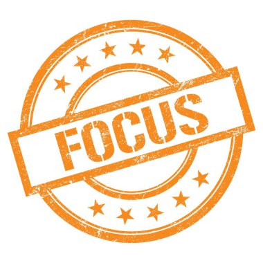 Turuncu yuvarlak vintage kauçuk damgalı FOCUS metni.