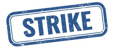Mavi grungy vintage dikdörtgen damgalı STRIKE metni.