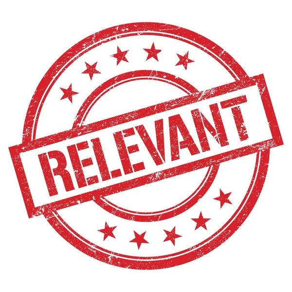 Kırmızı yuvarlak plastik damga üzerine yazılmış RELEVANT metni.