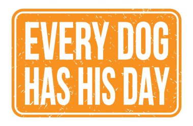 EVERY DOG HAS HIS DAY, words written on orange rectangle stamp sign
