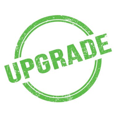 Yeşil grungy vintage yuvarlak pulla yazılmış UPGRAD metni.