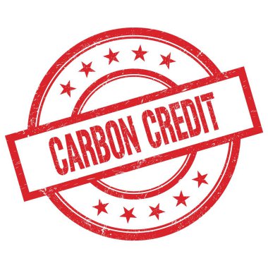 CARBON CREDIT kırmızı yuvarlak lastik damga üzerine yazılmış metin.