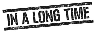 Siyah grungy dikdörtgen damgalı uzun bir zaman metninde.