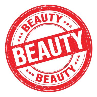 Kırmızı yuvarlak grungy işareti üzerine yazılmış BEAUTY metin
