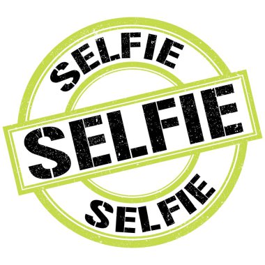 SELFIE metni yeşil-siyah yuvarlak pul işareti üzerine yazılmış