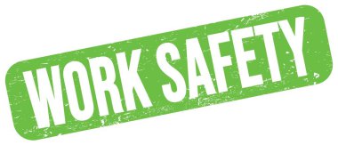 Yeşil mührün üzerine yazılmış İş Güvenliği metni.