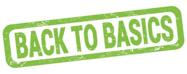 BACK TO BASICS text written on green rectangle stamp sign.