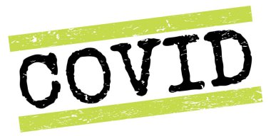 Yeşil-siyah grungy satır işareti üzerine yazılmış COVID metni.