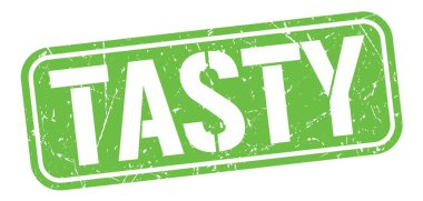 Yeşil grungy mühür işareti üzerine yazılmış lezzetli metin.