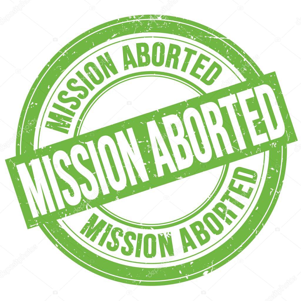 MISSION ABORTED text written on green round grungy stamp sign